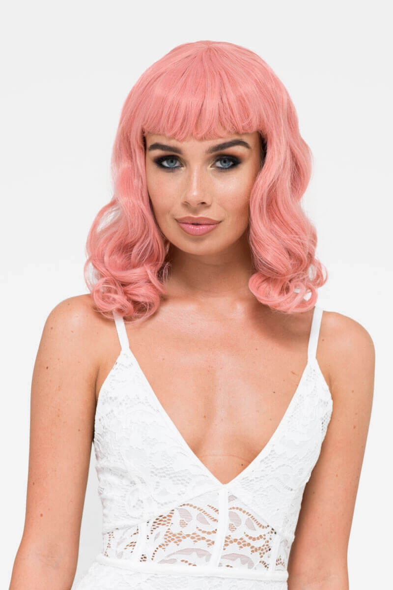 Pink pinup style wig, with finger waves and a short fringe, 1950s style: Stevie